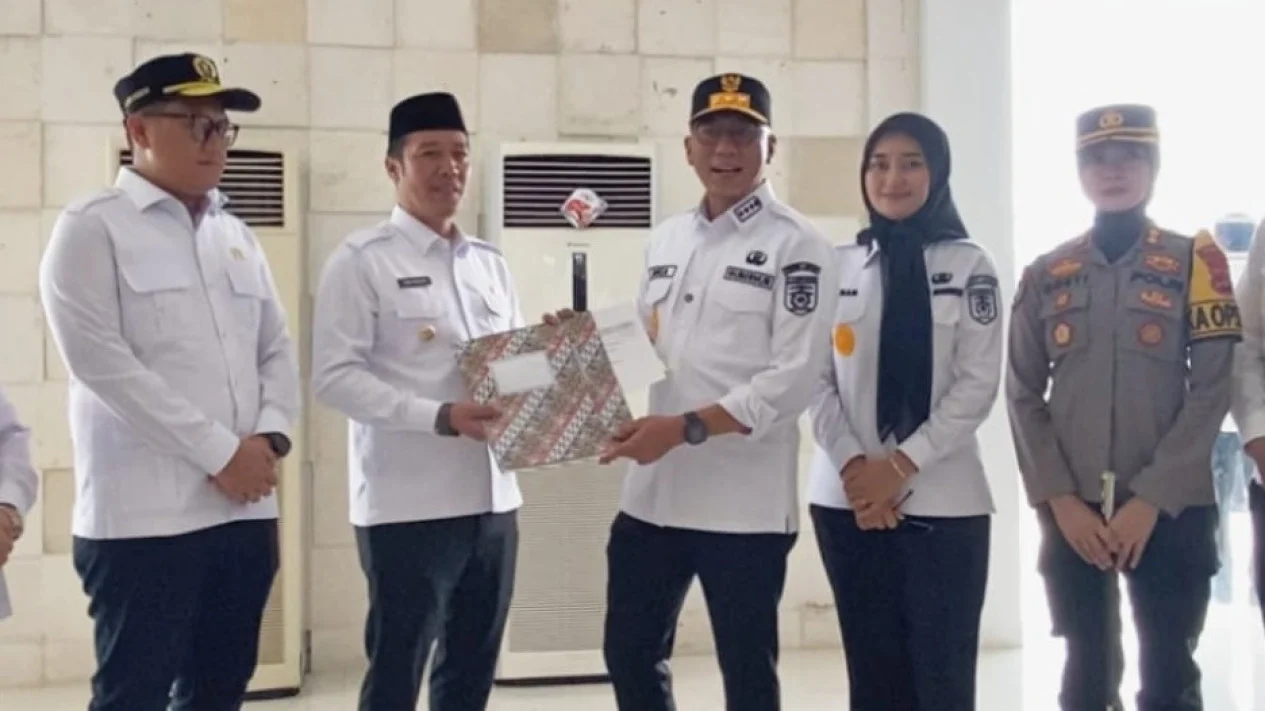 Pemkab Pesisir Barat Hibahkan Tanah Dan Gedung Samsat Untuk Tingkatkan Pelayanan Publik